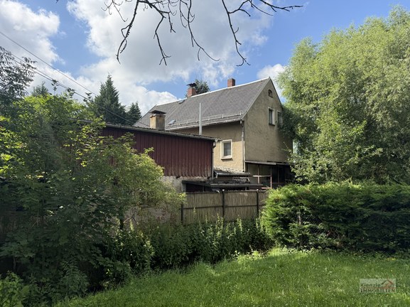 Kleines Einfamilienhaus mit Nebengebäude – Ideal für handwerklich Begabte