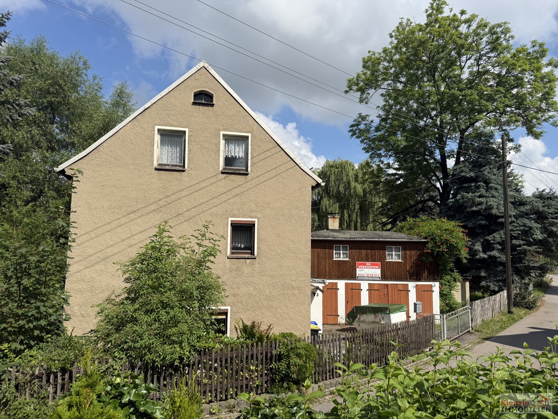 Kleines Einfamilienhaus mit Nebengebäude – Ideal für handwerklich Begabte